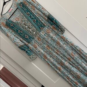 Boho dress fits like a Medium